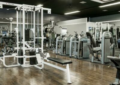 Fitness Equipment grouped together inside of gym
