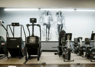 Fitness Equipment grouped together inside of gym