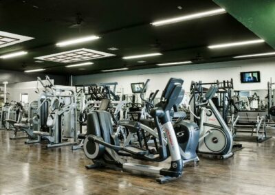 Fitness Equipment grouped together inside of gym