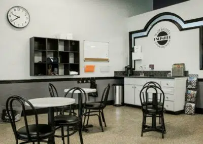 Gym break room with tables and chairs